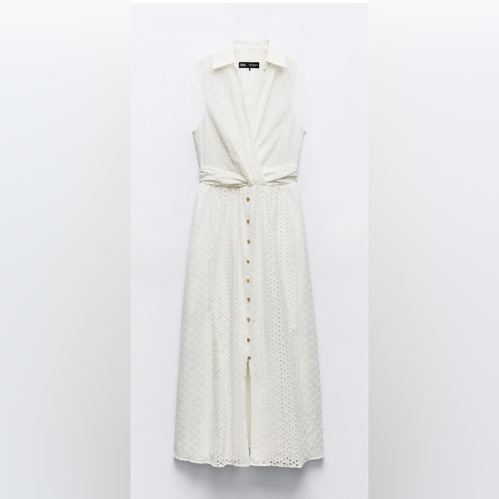 Sleeveless white eyelet dress
